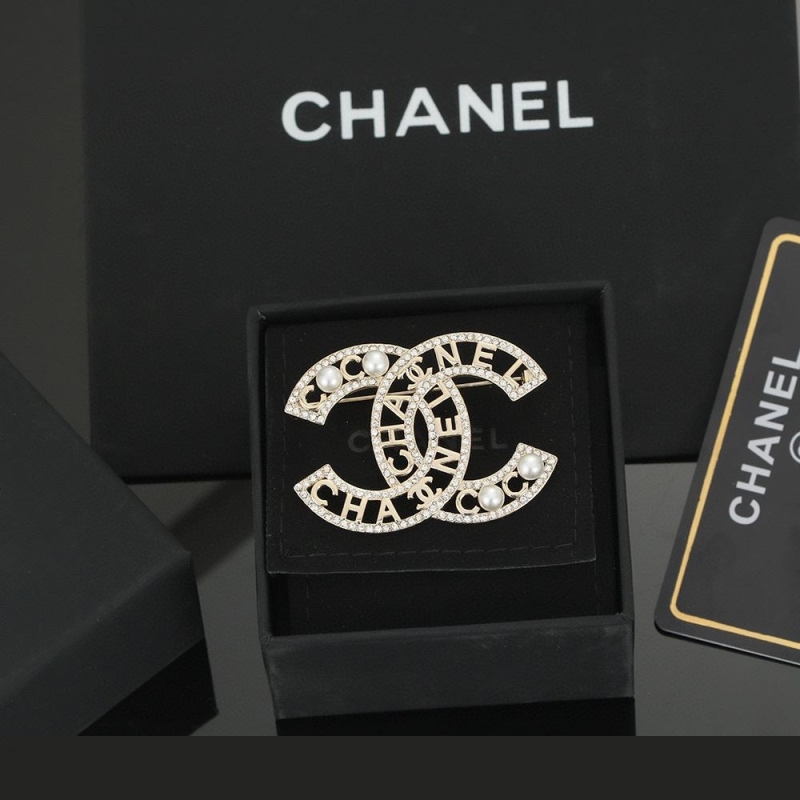 Ch*el brooches